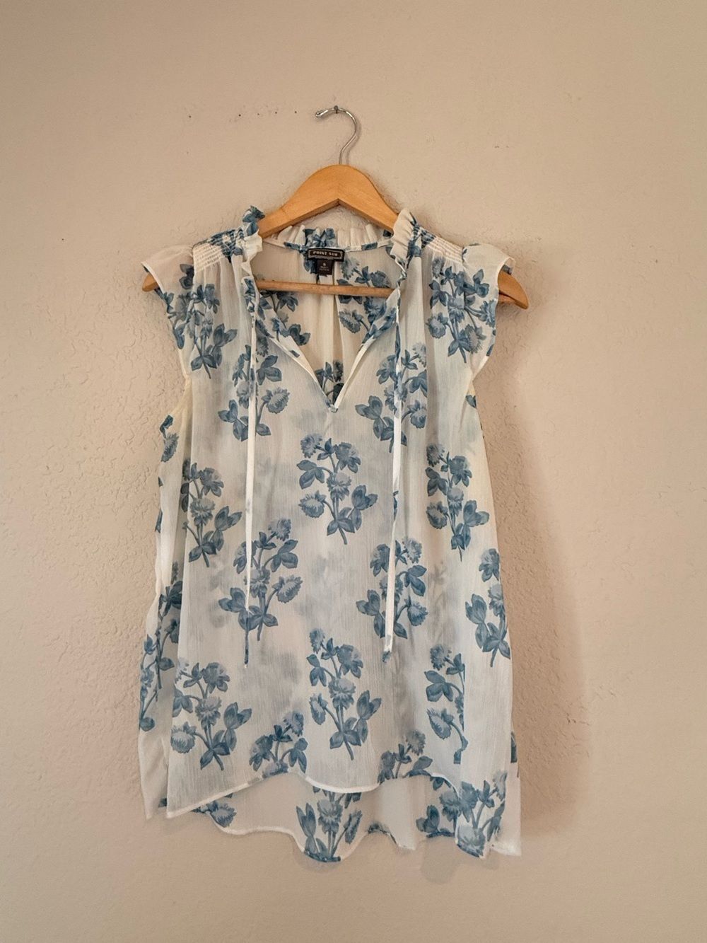 White and blue floral printed blouse